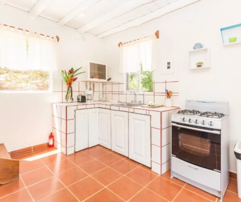 Fully equipped kitchen inside BBQ Villa at Casa Sollevante — ideal for extended stay yoga retreats in Montezuma, Costa Rica.