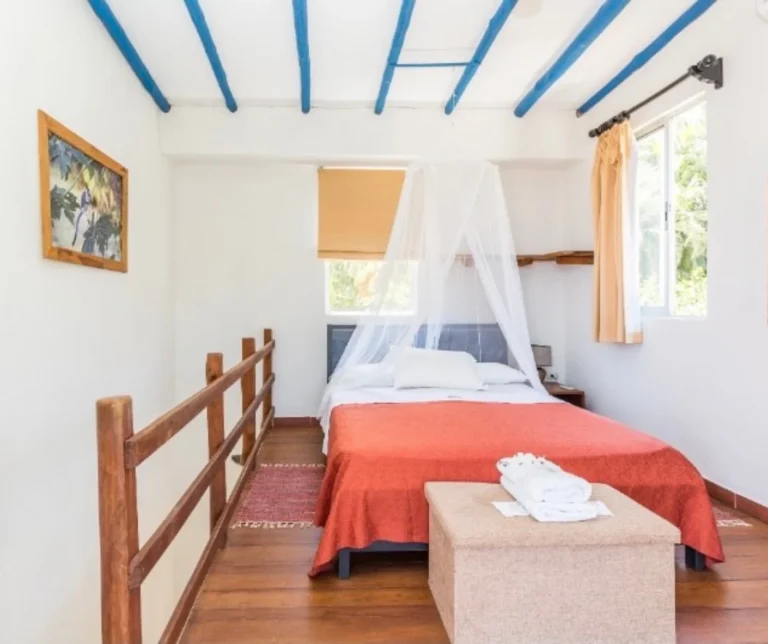 Private bedroom at BBQ Villa in Casa Sollevante — comfortable lodging for yoga retreats in Montezuma, Costa Rica.